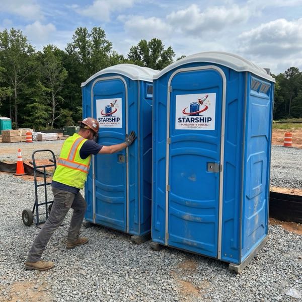 Standard portable toilet units at construction site